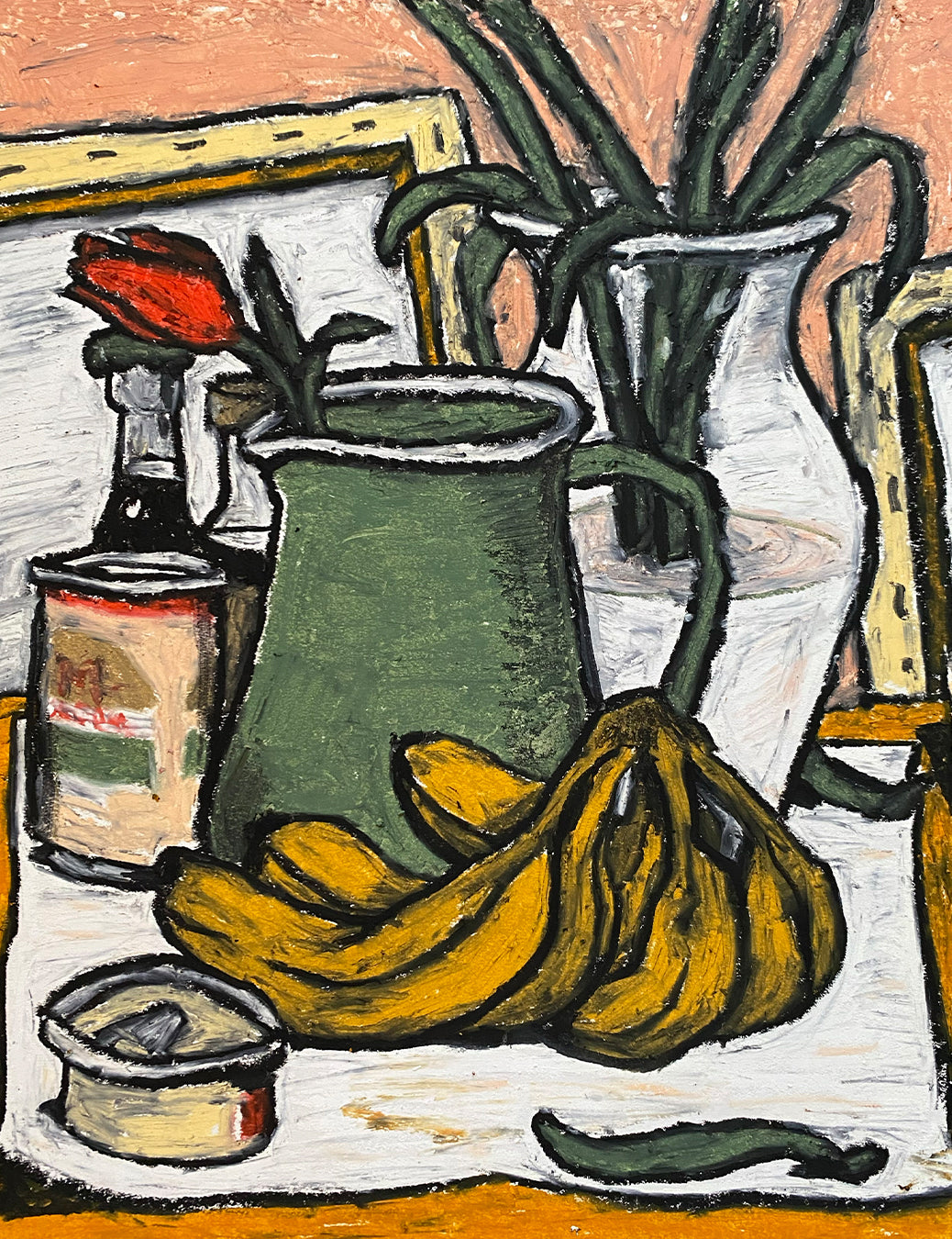 A rose in a pitcher at the studio