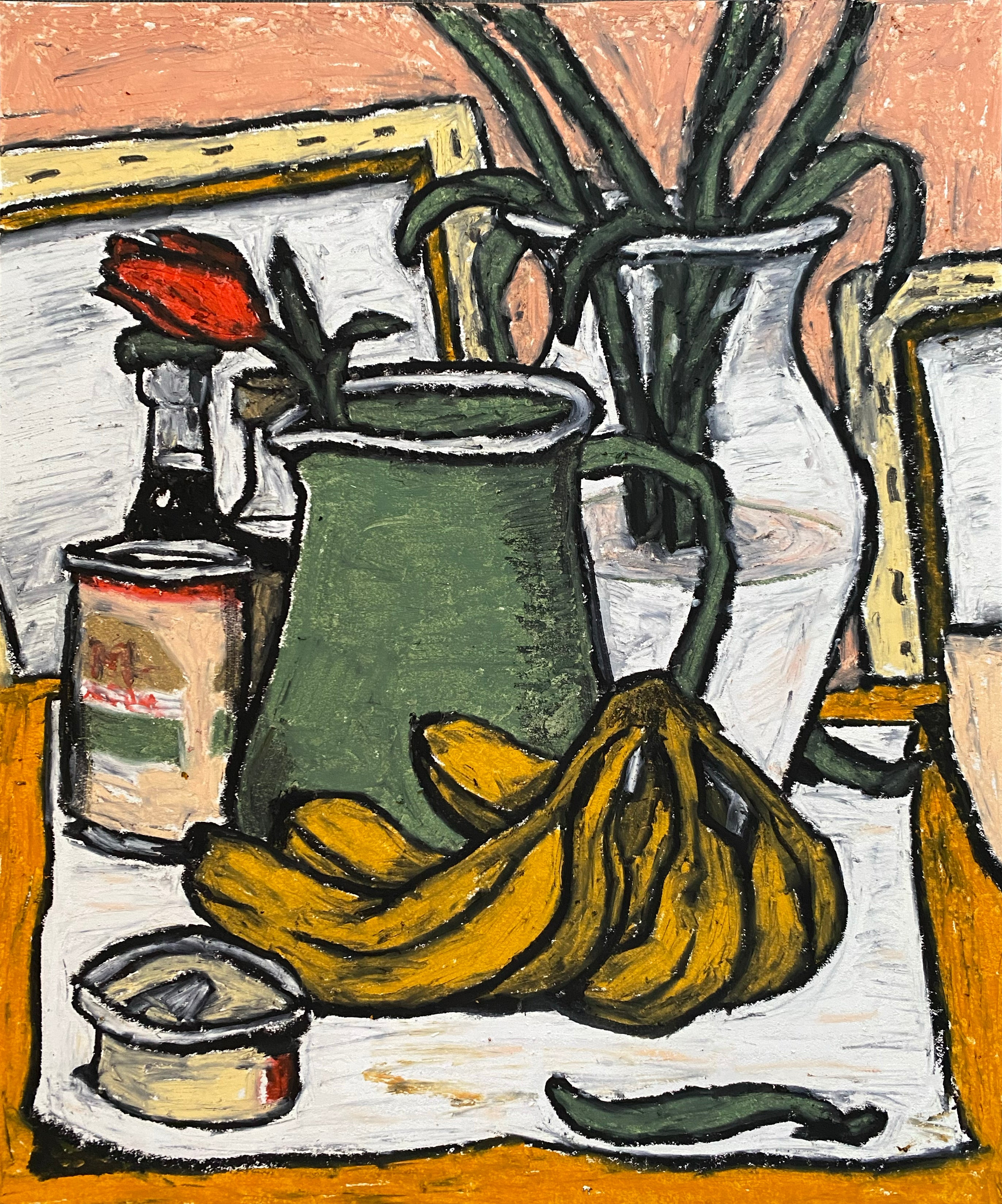 A rose in a pitcher at the studio